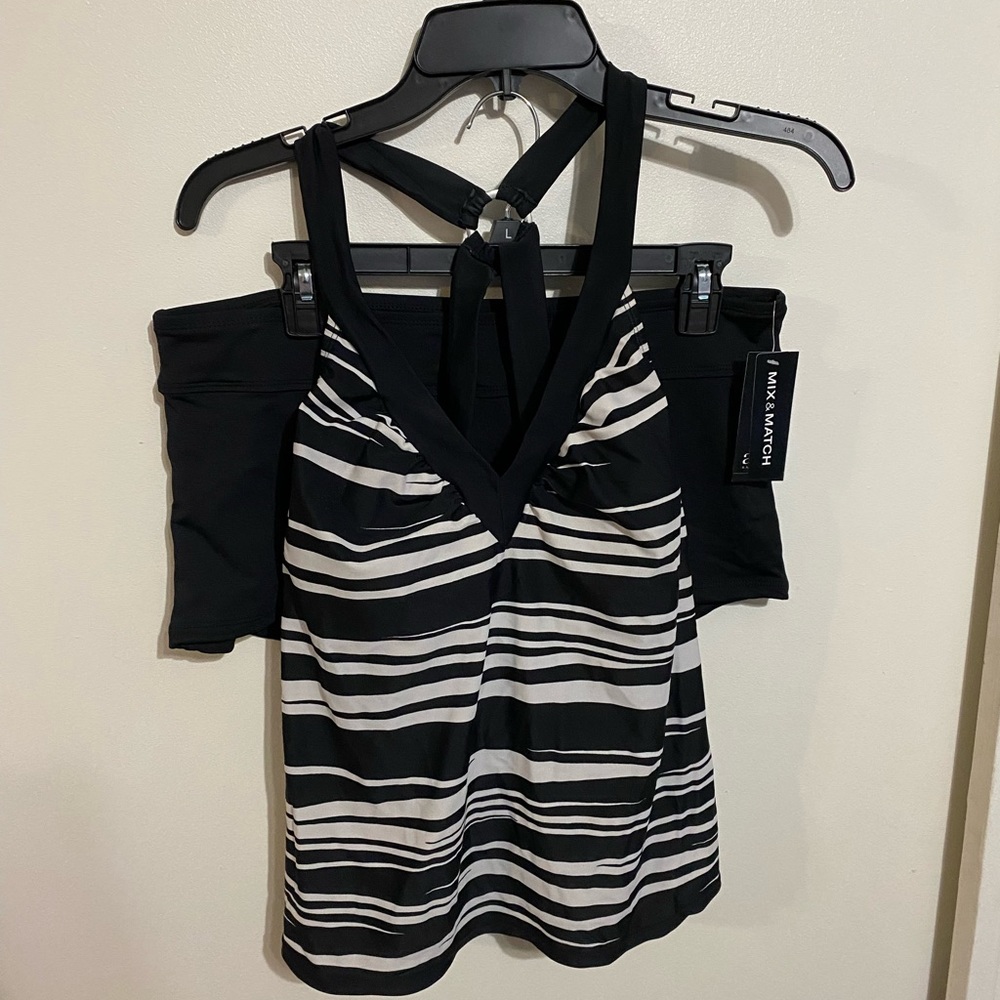 2 Bathing Suit tops and 1 bottom. Size XL.